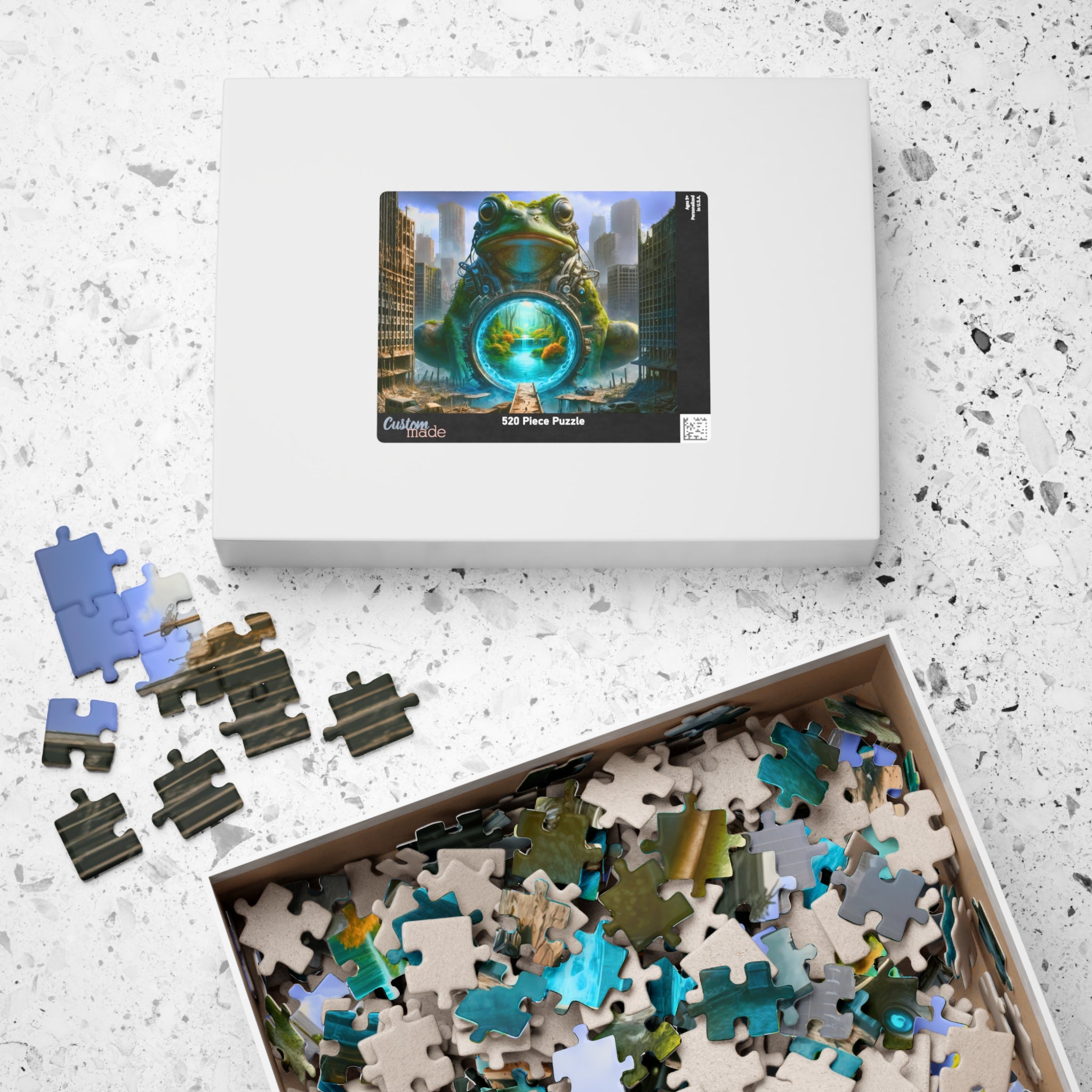 Box of the 520 Piece Frog Portal Puzzle from Printify, displaying the enchanting image of a frog and vibrant portal, along with colorful pieces for the perfect puzzle experience.