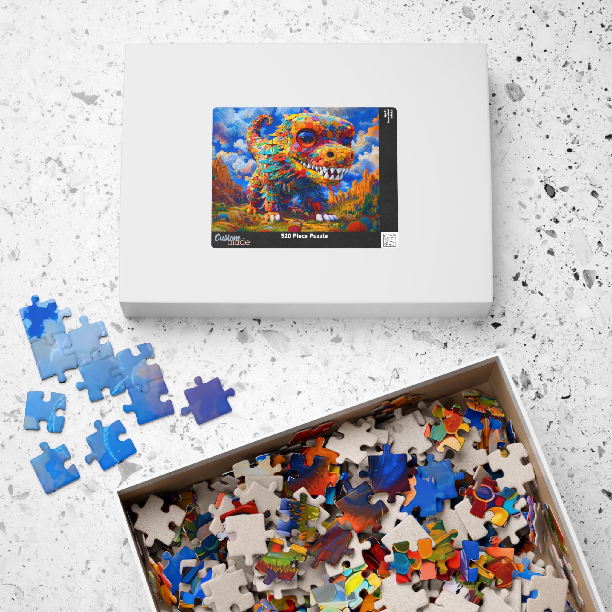 Packaging for Colorful Dog 520 Piece Art Puzzle by Printify, featuring an eye-catching image of the puzzle on the box with scattered puzzle pieces nearby.