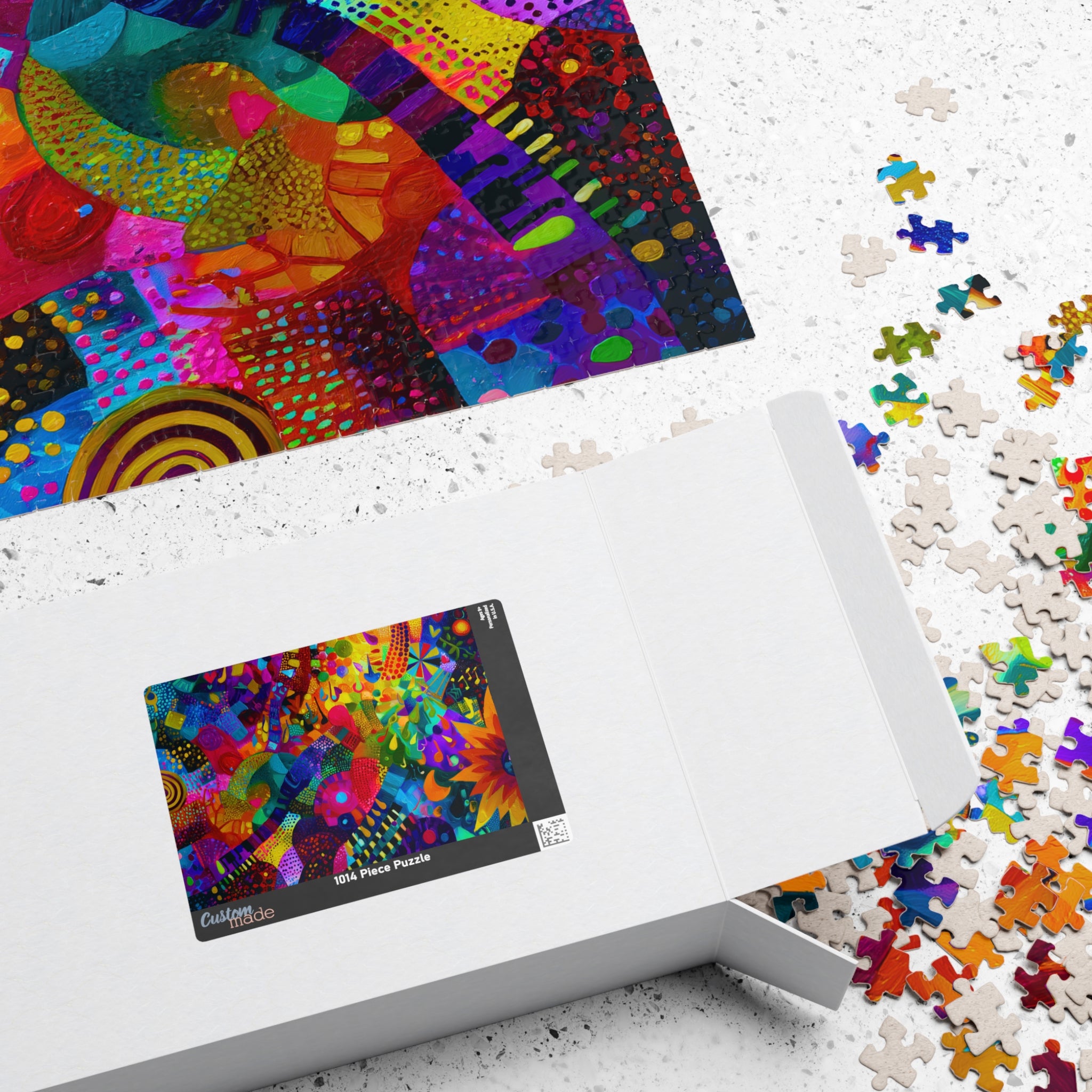 Packaging for the Impossible Abstract puzzle by Printify, featuring the colorful artwork on the box alongside scattered puzzle pieces.