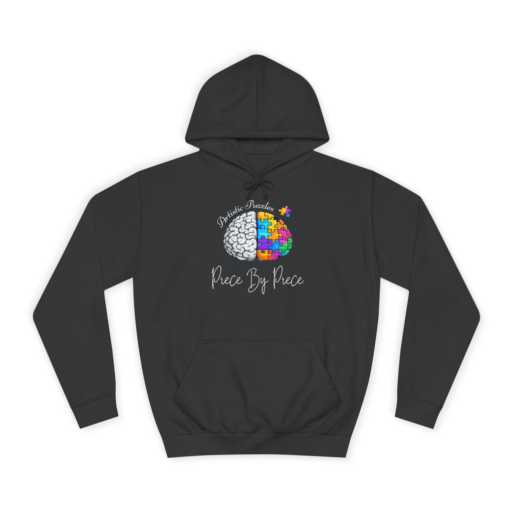 Artistic Puzzles ‘Piece By Piece’ Signature Brain Hoodie by Printify, featuring a colorful split-brain design on a dark background.