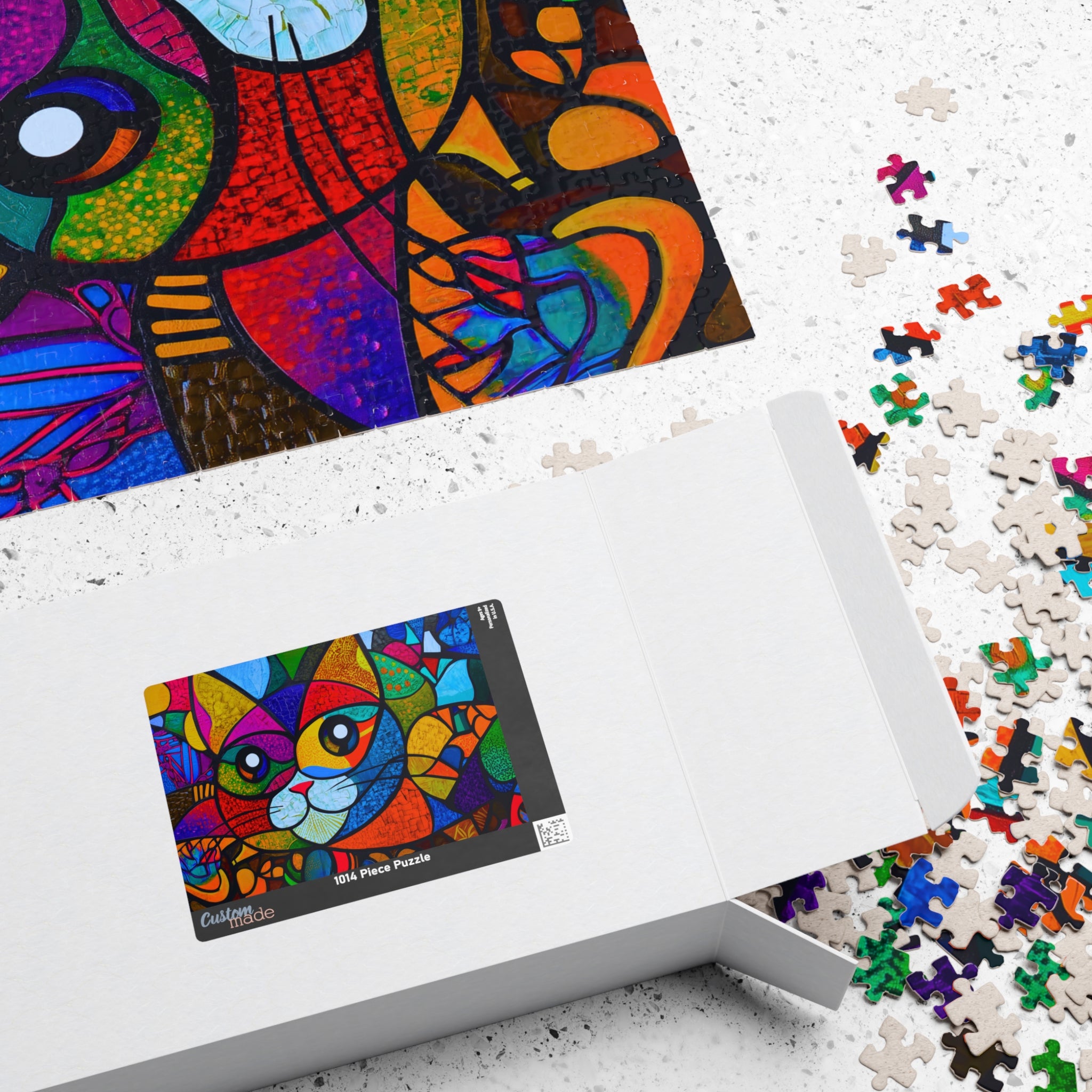Colorful Cat puzzle packaging opened to reveal the artwork and scattered pieces, presenting the creative design by Printify.