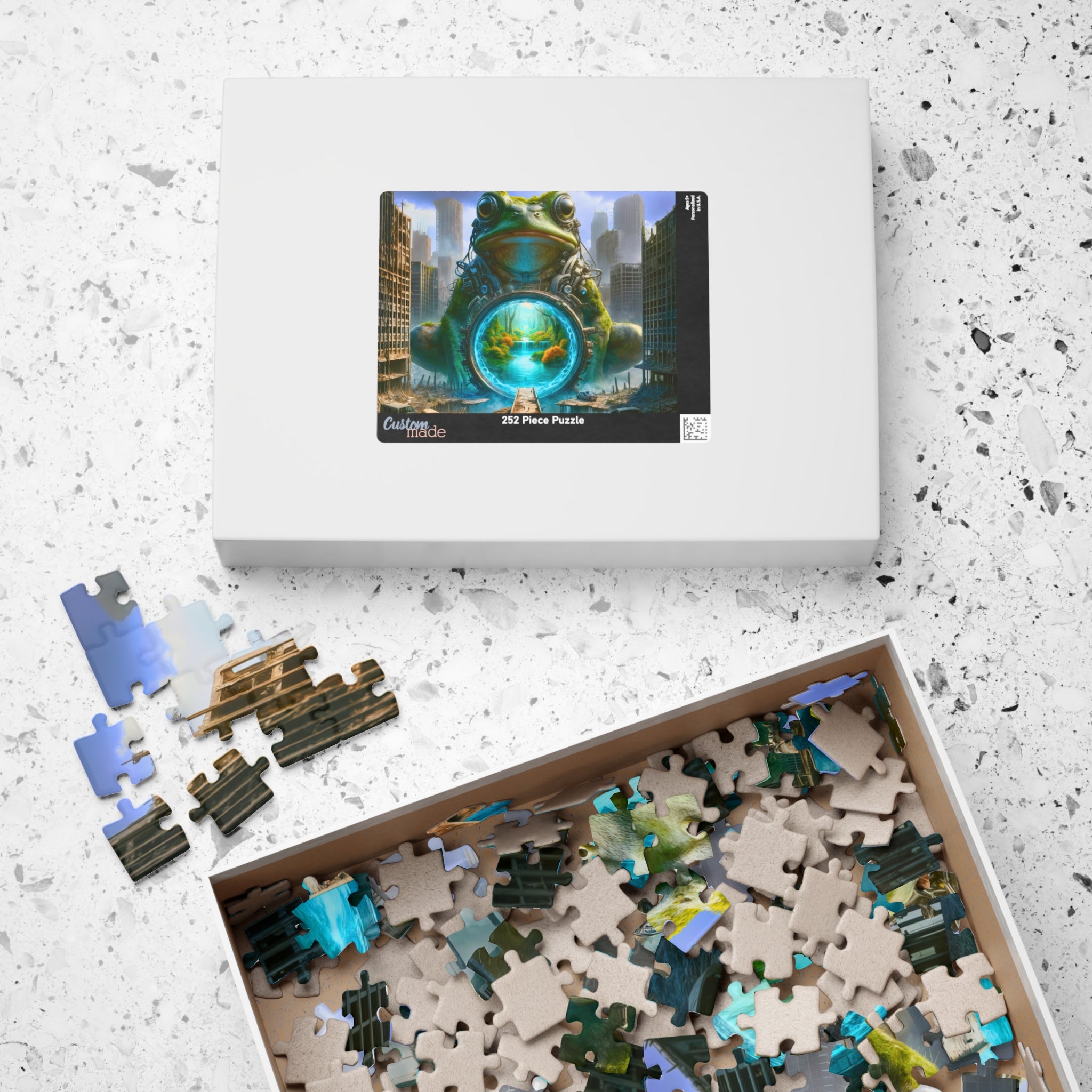 Box of the 252 Piece Frog Portal Puzzle from Printify, featuring the stunning artwork of a frog and portal, with colorful puzzle pieces inside for assembling.
